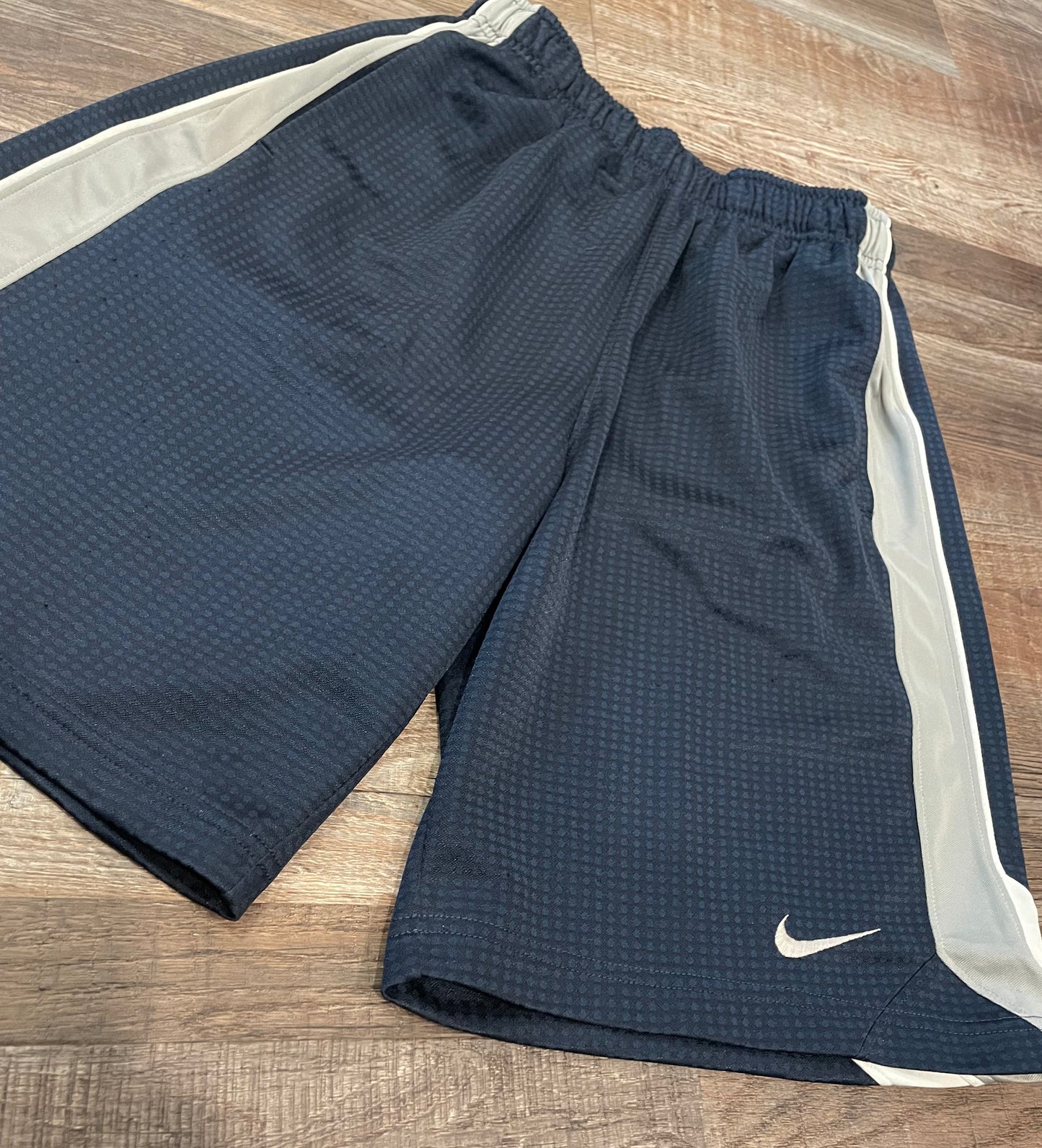 NIKE dark blue w/grey & white down the side boys shorts size medium