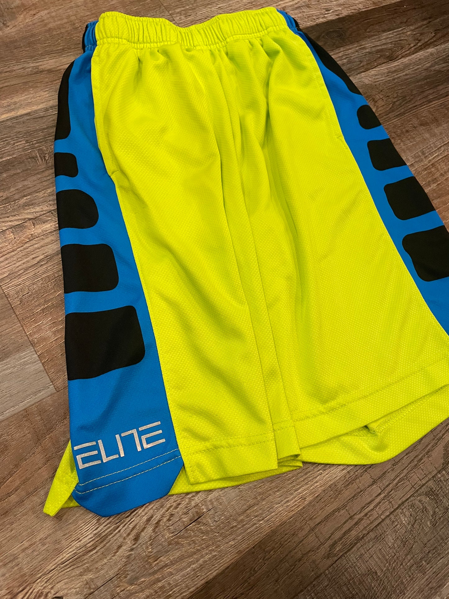 Nike Elite Neon green w/blue & black side strip Boys shorts size Medium